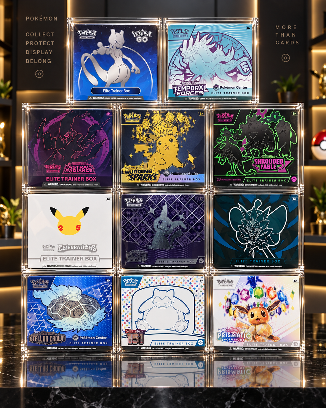 Pokémon Elite Trainer Box collection displayed in clear acrylic protective cases, featuring multiple Pokémon Center ETBs in a premium collector display.